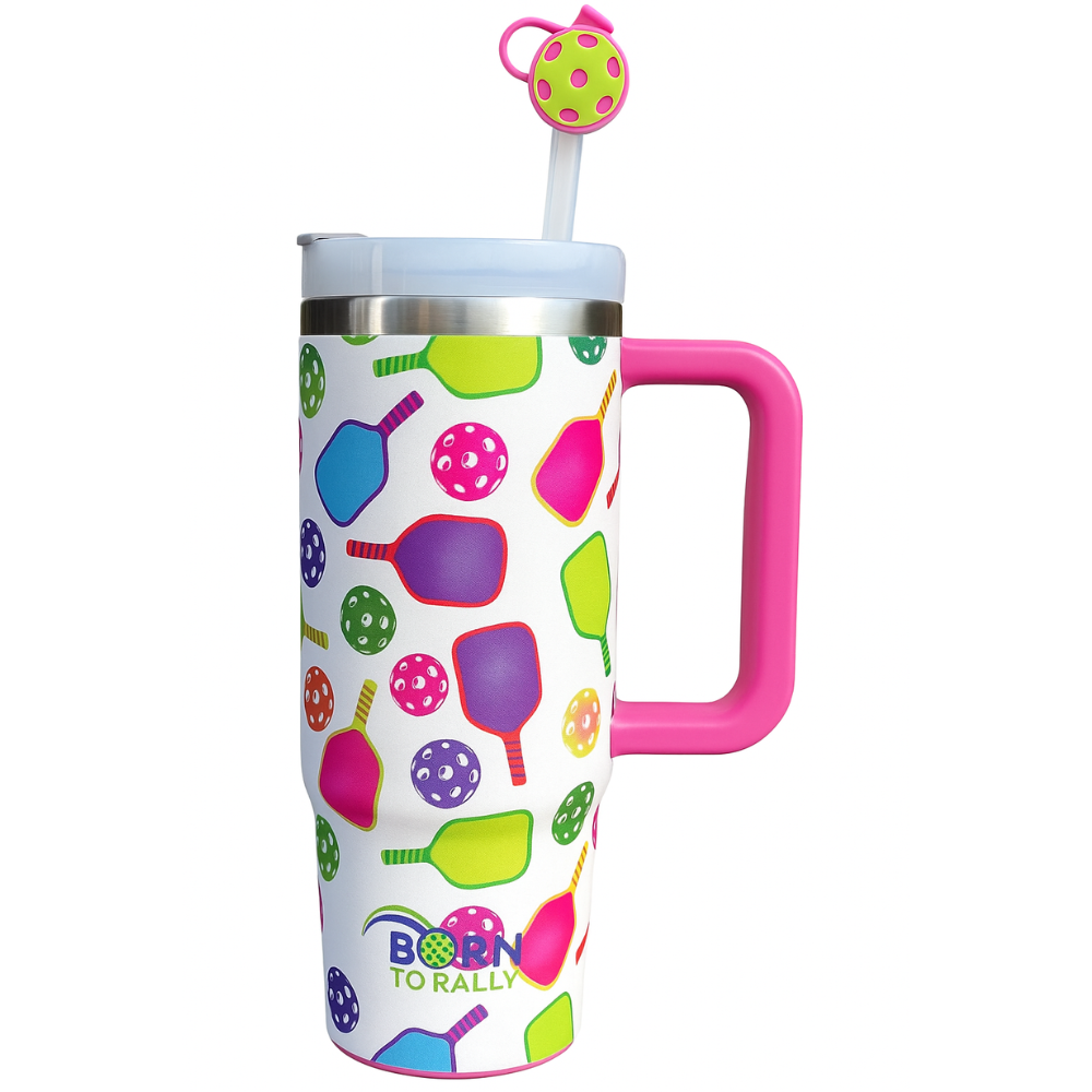 Stainless steel tumbler with pink handle and straw, featuring colorful pickleball paddles and balls pattern and “Born to Rally” logo—fun gift for pickleball lovers