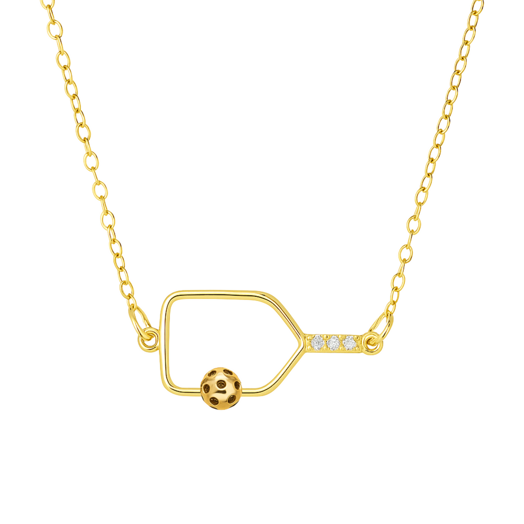 Elegant gold pickleball paddle necklace with sparkling crystals on the handle and a matching gold pickleball charm, stylish jewelry gift for pickleball enthusiasts