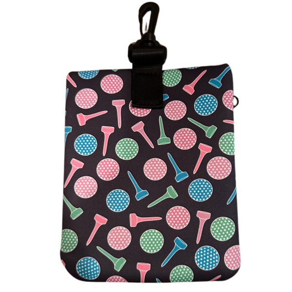 Colorful neoprene golf pouch bag with polka dot and tee print, perfect women's golf accessory for ball holding.