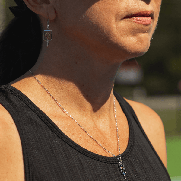 Woman Wearing Pickleball Jewelry Set - Necklace & Earrings