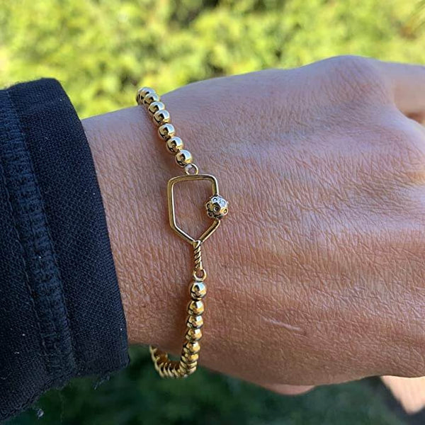 Gold Pickleball Beaded Stretch Bracelet on the Wrist